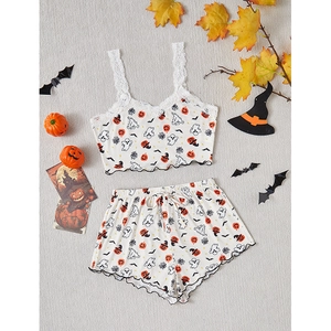Sexy lace pajama set with Halloween pumpkin and ghost print featuring crop top and shorts