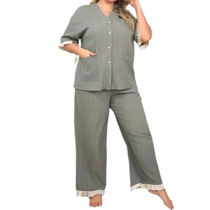 Sage green V-neck pajama set with ruffle trim and button-up short sleeve top with pants
