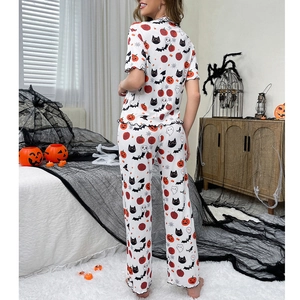 Women Halloween pajama set with pumpkin print short sleeve top and long pants