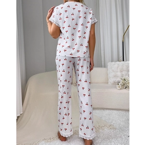 Women's two-piece cherry print pajama set with lace trim and waffle knit fabric