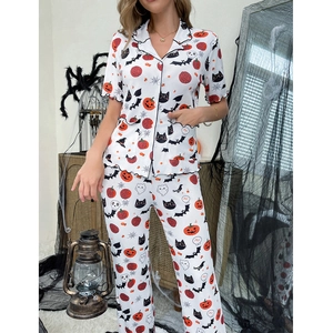 Halloween pumpkin bat pajama set with button-down top and long pants for women