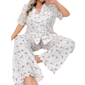 Floral print pajama set for women featuring short sleeve button top and wide-leg pants