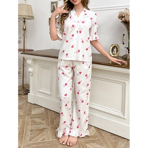 Women heart print pajama set with button-up short sleeve top and flare ruffle trousers
