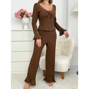 Brown waffle knit pajama set featuring lace bell sleeves and a ribbon bow accent