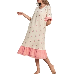 Women's floral summer nightgown featuring round neck and pink ruffled hem detail