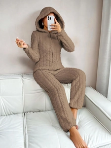 Detail of warm brown coral fleece loungewear set with quilted texture and hood zip