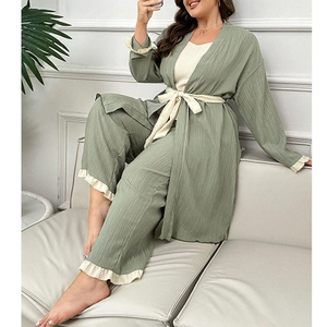 Three-piece women's loungewear set with sage green cardigan, camisole, and straight pants