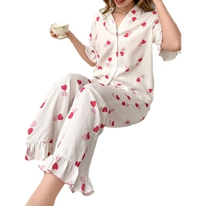 Women's heart print pajama set with short sleeve button-down top and ruffled trousers
