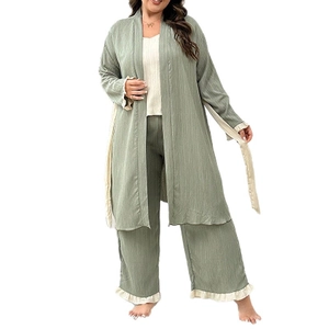 Three-piece green loungewear set featuring a cardigan, camisole, and wide-leg pants