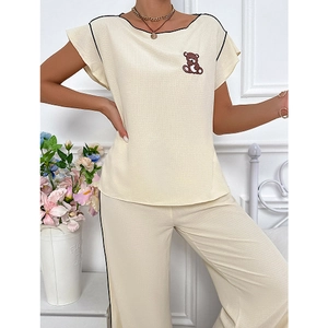 Cute beige bear pajama set with short-sleeve top and wide-leg pants for women