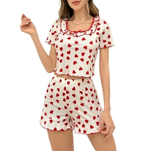 Women's pajama set with red heart print, ruffle trim, and square neck design in beige