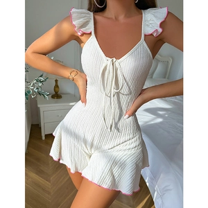 White crinkle romper for women with pink ruffle trim and bow tie summer lounge wear