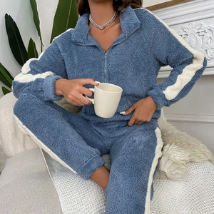 Cozy blue fleece pajama set with white side stripes and lapel collar for women
