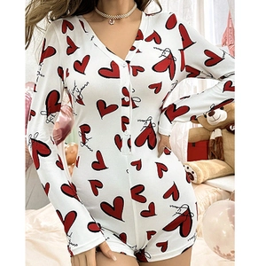 Women's V-neck long sleeve romper in white with red heart print and button-front closure
