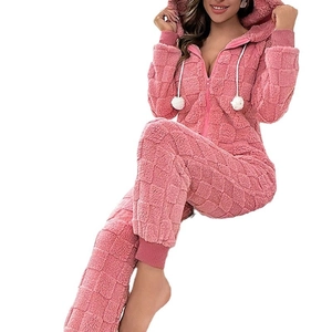 Pink coral fleece hooded jumpsuit pajamas with waffle pattern and pompom drawstrings
