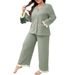 Women's V-neck green lounge set with long sleeves and white lace trim details