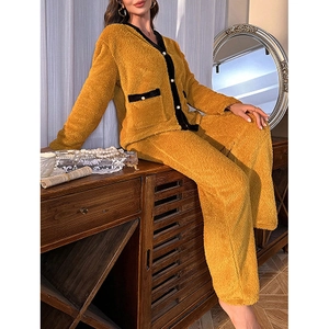 Two-piece yellow coral fleece pajama set with v-neck cardigan and pearl buttons