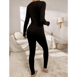 Ensemble de détente noir pour femme, coupe ajustée avec haut à manches longues, vue de dos