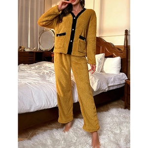 Women coral fleece thermal pajama set in yellow and black contrast with pearl buttons