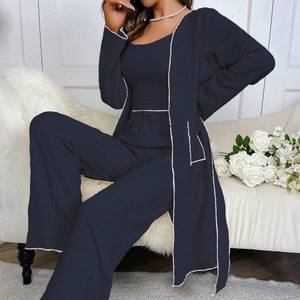 Three-piece navy blue lounge set with contrast piping and textured fabric