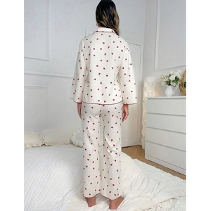 Women's cream pajama set with red heart print and quilted long sleeves and pants