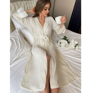 Elegant cream pleated long-sleeve bathrobe with tie waist and decorative ruffled cuffs