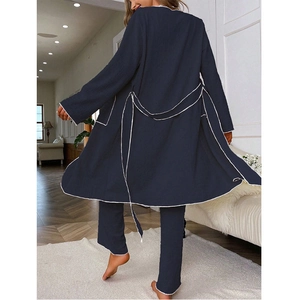 Women's 3-piece navy blue waffle lounge set with white trim cardigan and long pants