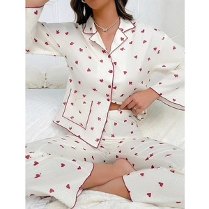 Women heart print pajama set with long sleeve button-down top and matching trousers