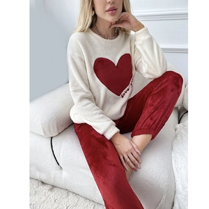 Women's warm coral fleece heart pajamas set with white top and red pants for home