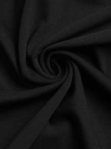 Detail of premium black mesh fabric with a dense weave texture for A-line dresses