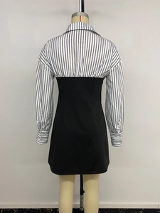 Back view of a faux two-piece striped dress with a lapel collar on a mannequin
