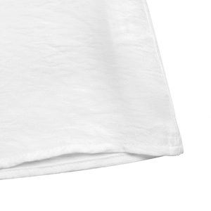 Detail of double-needle stitching on the hem of a white lace V-neck long sleeve shirt