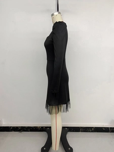 Detail of black long sleeve dress with mesh patchwork hem and high waist slim fit design
