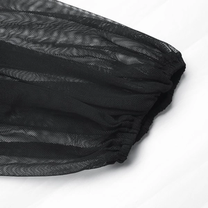 Close-up of black mesh puff sleeve cuffs showing delicate texture and elastic ruffles