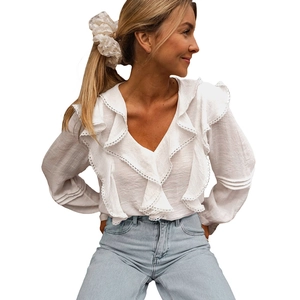 Elegant white V-neck long sleeve blouse with lace trim and ruffle details for women