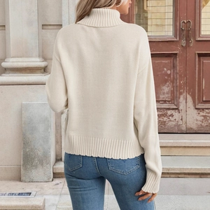 Ethnic knit pattern turtleneck sweater for women in beige viewed from the back