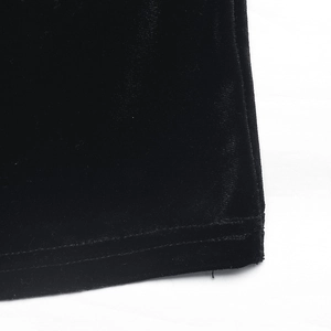 Detailed close-up of the double-needle hem stitching on premium black velvet fabric