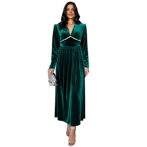 Elegant emerald green V-neck velvet dress with long sleeves and lace high-waist detail