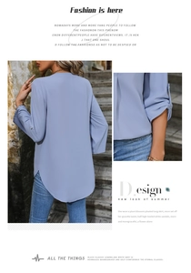 Detail of adjustable sleeves and high-low hem on a light blue V-neck women blouse
