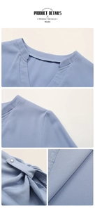 Detail of light blue shirt featuring V-neckline, buttoned cuffs and premium stitching