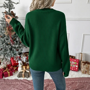 Deep green chunky knit sweater with vertical texture and ribbed cuffs for Christmas