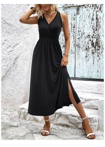 Detail of elegant black deep V-neck wrap maxi dress with sexy high side slit