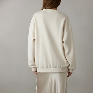 Women's minimalist off-white oversized sweatshirt with crew neck and long sleeves back view