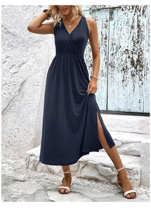 Detail of navy blue V-neck maxi dress featuring elastic waist and side slit detail