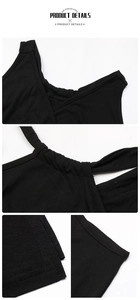 Detail showing the deep V-neck design and fine stitching on this black cotton dress
