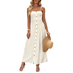 Elegant white smocked sundress with decorative buttons and adjustable thin shoulder straps
