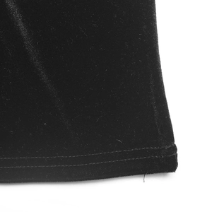 Detailed macro view of black velvet fabric texture and professional double-needle hem stitching