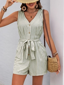 Detail of green striped sleeveless romper featuring V-neck buttons and waist tie