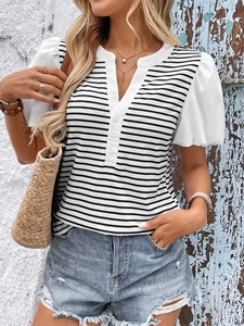 Detail of white puff sleeves and button-down Henley collar on a striped summer top
