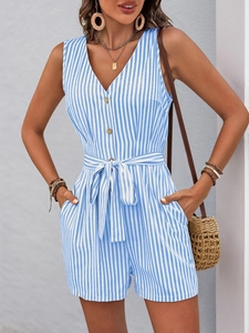Detail of blue striped romper featuring V-neck, wooden buttons, and a waist tie-up bow